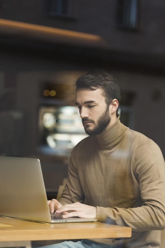 high angle young entrepreneur working